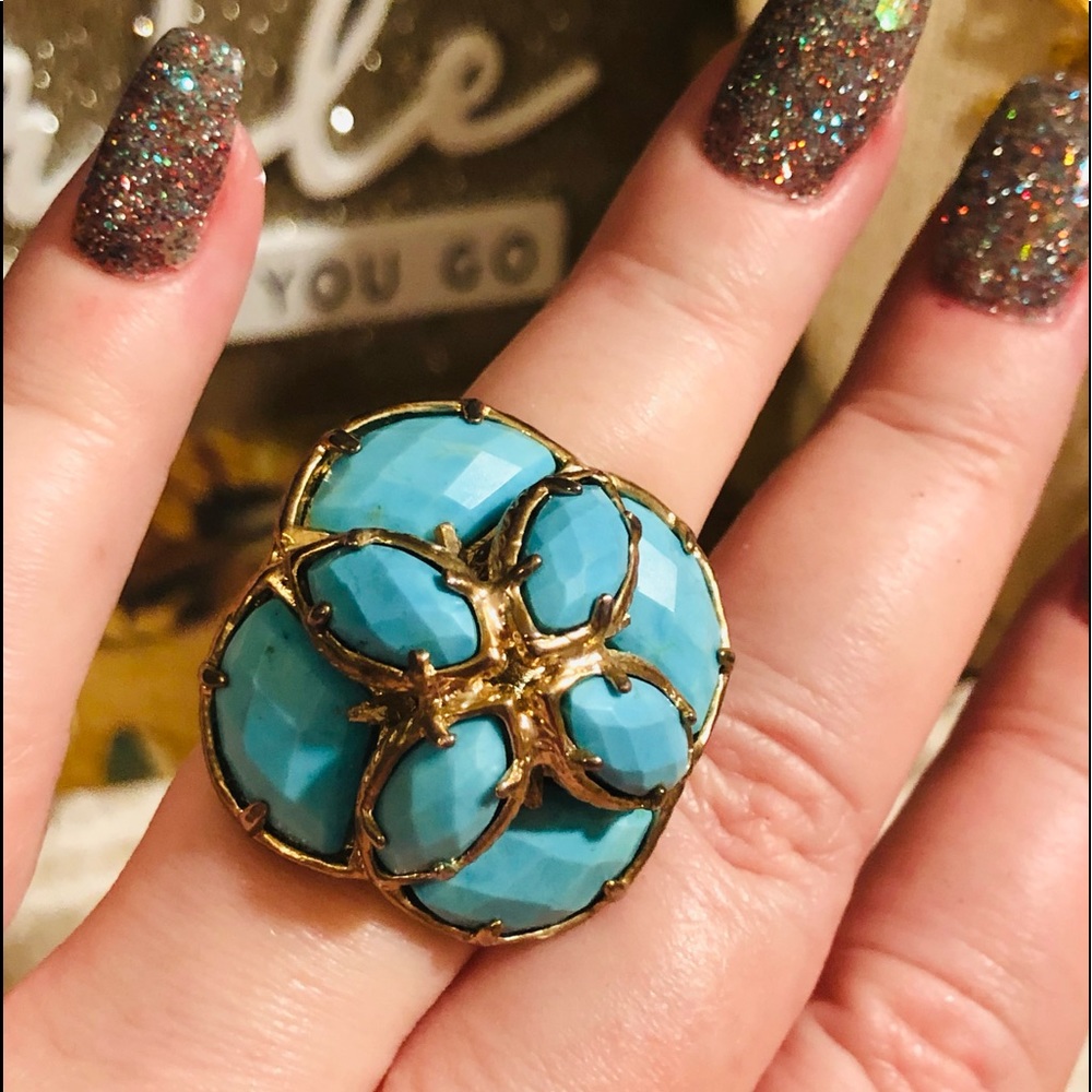 Turquoise colored faceted stone ring